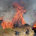 Wildfires burn through the night in Eastern Europe as over 50 blazes in Greece alone sees families evacuated from their homes